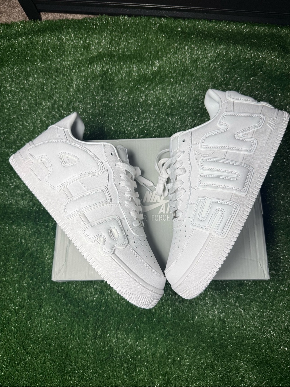Nike All-White Low Top Sneakers with Bold 'SUP' Stitching